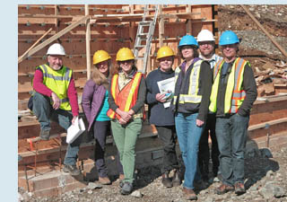 Photo of 
		construction crew.